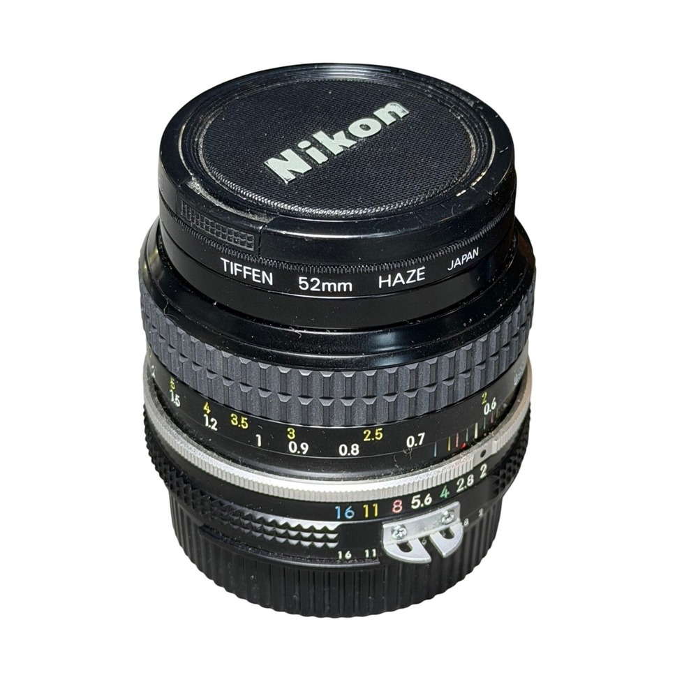 Nikon Nikkor 50mm f/2 Ai Manual Focus Prime Lens with 52mm Tiffen Haze Filter